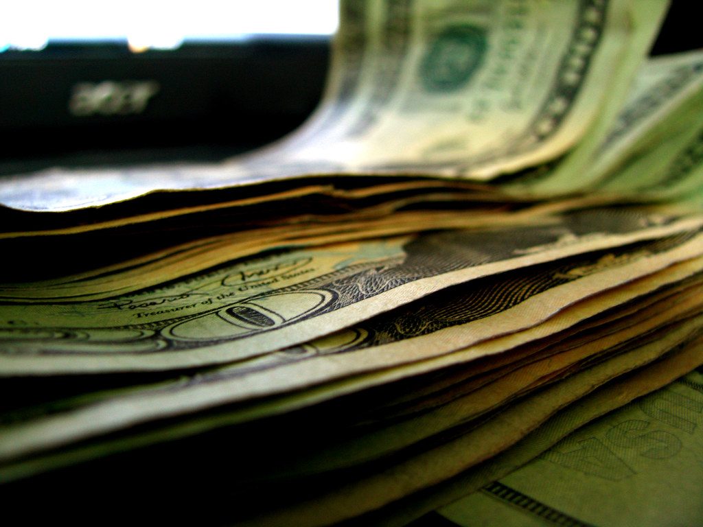A stack of U.S. dollar bills