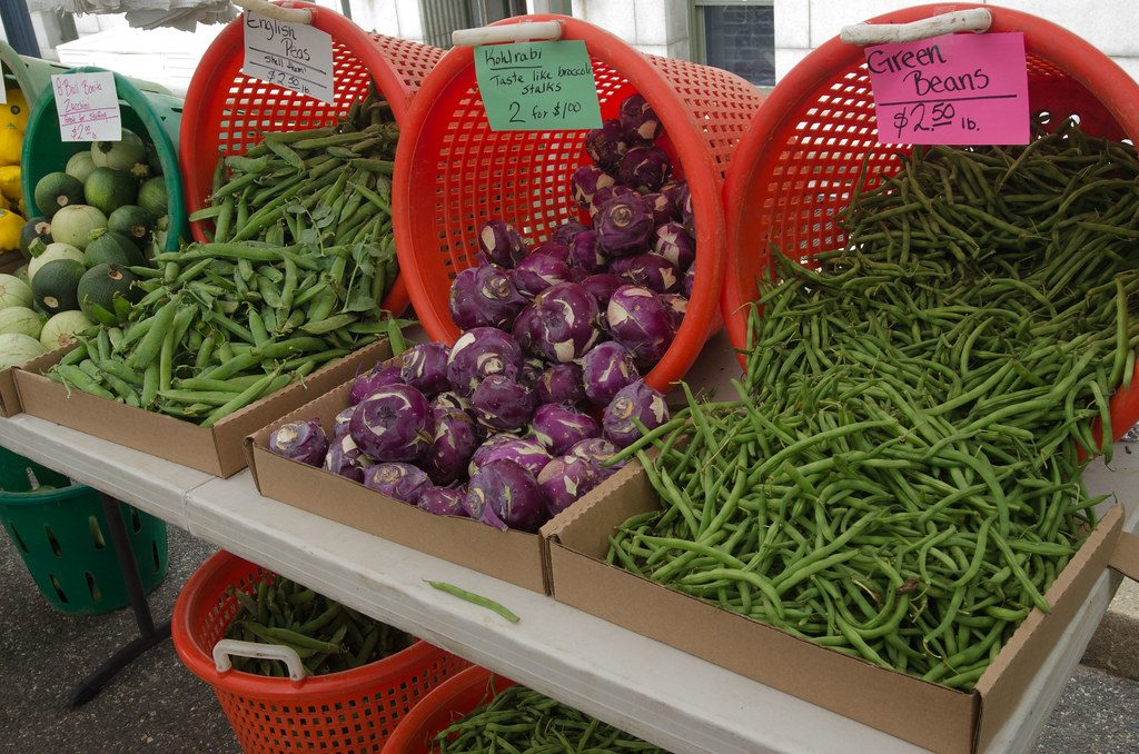 Baskets of vegetables at a farmers market