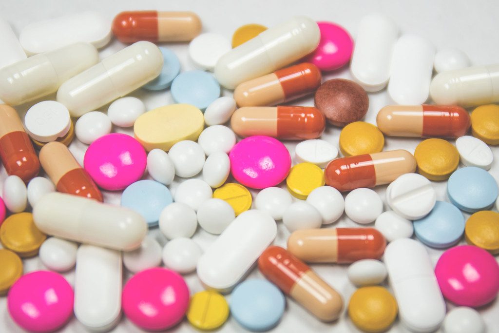 Assorted colorful pills and capsules