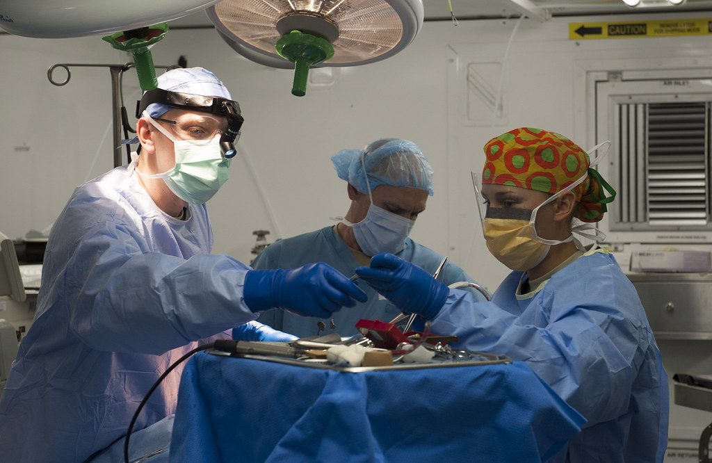 Surgeons at work in an operating room