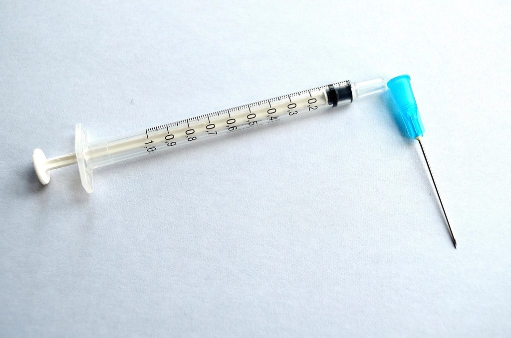 A syringe with a needle